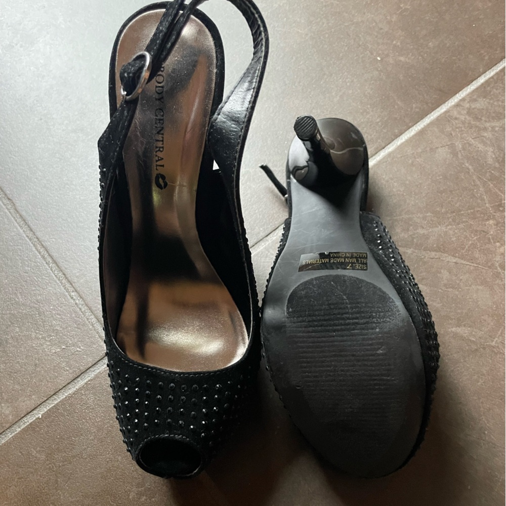 Size 7 evening peep toe sling back.